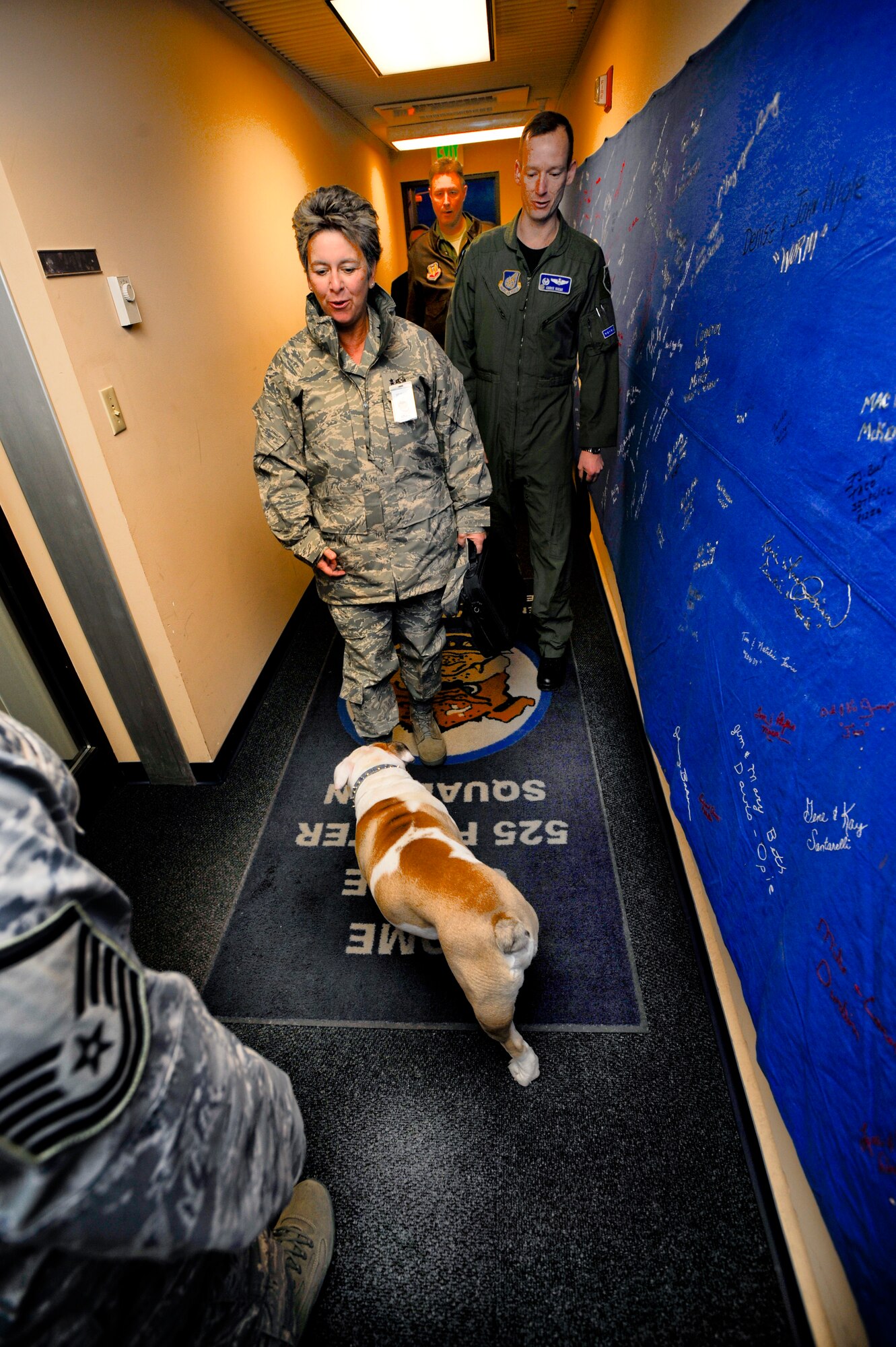 ELMENDORF AIR FORCE BASE, Alaska -- Fado, 525th Fighter Squadron mascot, greets Maj. Gen. Anita Gallentine and the Installation Excellence team during their tour of the facility Jan. 28. Maj. Gen. Gallentine and the Installation Excellence team were here to evaluate Elmendorf as one of two finalists for the Air Force Installation of the Year award. (Air Force photo by Senior Airman Matt Coleman-Foster)