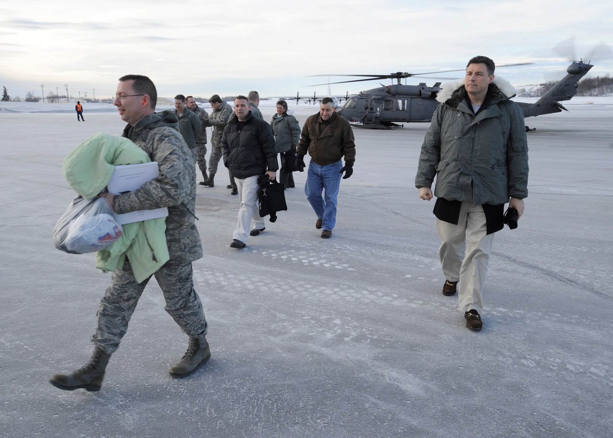 ELMENDORF AIR FORCE BASE, Alaska -- 3rd Wing leadership greet Maj. Gen. Anita Gallentine and the Installation Excellence team at the passenger terminal after their aerial tour of Elmendorf Air Force Base Jan. 27. Maj. Gen. Gallentine and the Installation Excellence team were here to evaluate Elmendorf as one of two finalists for the Air Force Installation of the Year award. (Air Force photo by Senior Airman Matt Coleman-Foster)