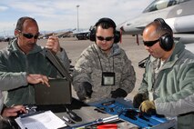 Airmen assigned to the 482nd Maintenance Group conduct maintenance on an F-16 aircraft before a Red Flag mission, Jan. 26. Red Flag is a two-week aerial combat training exercise conducted over the Nevada Test and Training Range. (U.S. Air Force photo/Tech. Sgt. Bucky Parrish)