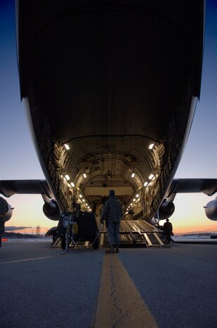 The rear of a McChord AFB, Wash., C-17 sits wide open and ready for supplies in Toledo, Ohio, Jan. 30. The C-17 took off from Charleston AFB and made a brief three-hour stop in Ohio. During that time, numerous pallets of supplies were loaded onto the C-17 for transport to Port-au-Prince, Haiti, in support of Operation Unified Response. (U.S. Air Force Photo/Airman 1st Class Lauren Main)
