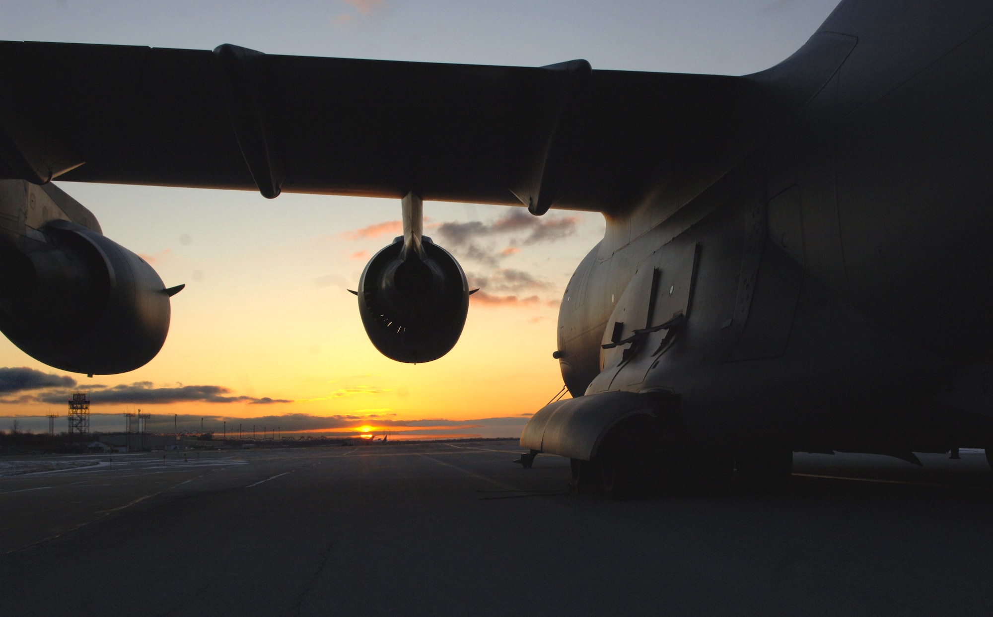 A McChord AFB, Wash., C-17 sits parked on the flightline in Toledo, Ohio, Jan. 30. The aircraft and its crew flew from Charleston AFB to Ohio for supplies and then on to Haiti in support of Operation Unified Response. (U.S. Air Force Photo/Airman 1st Class Lauren Main)
