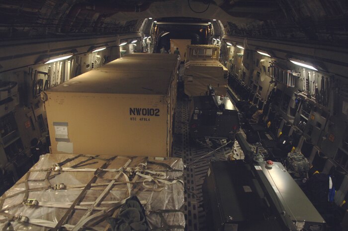 Cargo bound for Port-au-Prince, Haiti, sits aboard a McChord AFB, Wash., C-17 aircraft after taking off from Charleston AFB Jan. 30. A McChord aircrew manned the aircraft, and the mission was coordinated through Charleston AFB's C-17 stage operation to expedite the launch of aircraft for missions to Haiti. (U.S. Air Force Photo/Airman 1st Class Lauren Main)