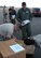 Tech. Sgt Barry Burkitt goes over packages prior to their loading Jan. 30 at Homestead Air Reserve Base, Fla. The packages were later loaded onto a C-130 Hercules operated by the 302nd Airlift Wing, one of two wings assigned to the 35th Expeditionary Airlift Squadron, which supports Air Expeditionary Force Coronet Oak. The members are deployed in support of Haiti earthquake relief operations, some of which are based at Muniz Air Base, Puerto Rico. (U.S. Air Force photo/Staff Sgt. Stephen J. Collier)
