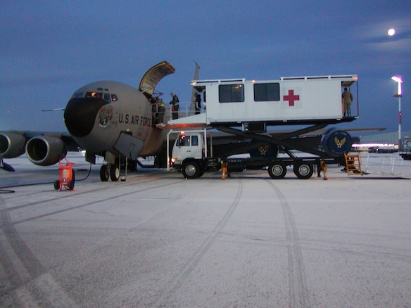 A specialized medical K-Loader prepares to offload patients who have been recently flown in a Utah Air National Guard KC-135 from Bagram Air Base, Afghanistan to Ramstein AB, Germany. Once medical ground crews offload the patients, they will be transported to the Landstuhl Regional Medical Center for further medical treatment. U.S. Air Force photo by Maj. Dan Boyack. (Unclassified)