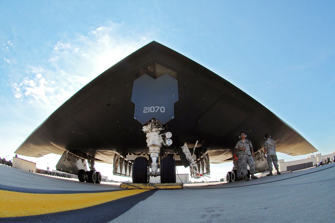 Crew chiefs with the 509th Aircraft Maintenance Squadron prepare a B-2 Spirit for flight Aug. 24, 2009, at Whiteman Air Force Base, Mo. The B-2's primary mission is to attack time-critical targets early in a conflict to minimize an enemy's warfighting potential. (U.S. Air Force photo/Senior Airman Kenny Holston)