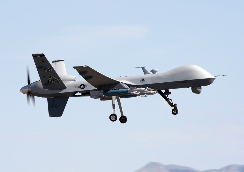 An  MQ-9 Reaper flies above Creech Air Force Base, Nev., during a local training mission. The 42nd Attack Squadron at Creech AFB operates the MQ-9. The 188th Fighter Wing is currently in the beginning stages of converting from A-10C Thunderbolt II “Warthogs” to an MQ-9 Reaper remotely piloted aircraft (RPA) mission. (U.S. Air Force photo/Paul Ridgeway)