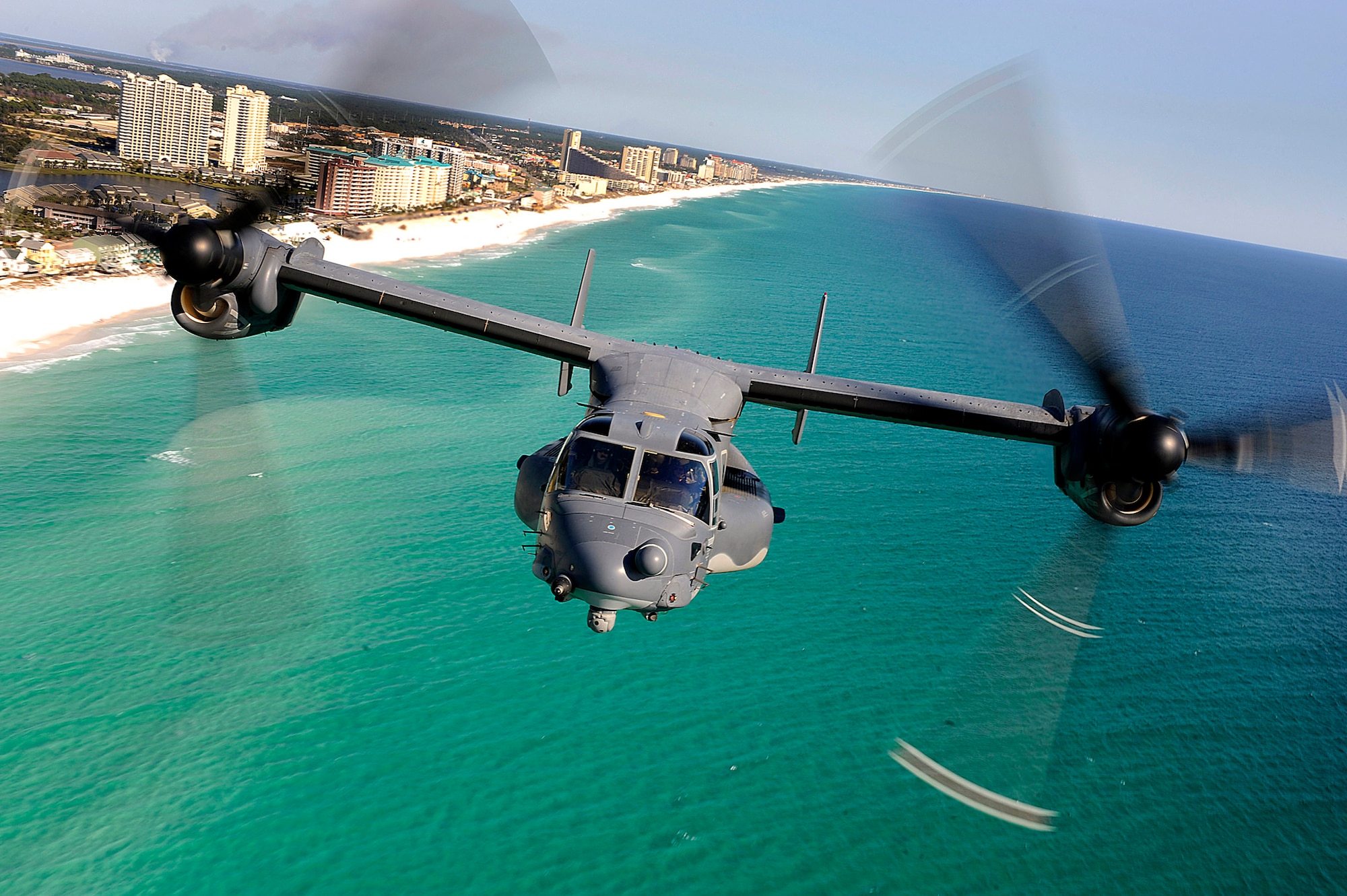 A CV-22 Osprey aircraft from the 8th Special Operations Squadron at Hurlburt Field, Fla., flies Jan. 31, 2009, over Florida's Emerald Coast. While over the water, the crew practiced using a hoist, which is used to rescue stranded people. (U.S. Air Force photo/Senior Airman Julianne Showalter)