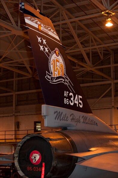 To commemorate the 150th Anniversary of the Colorado National Guard, the 140th Wing painted an F-16 tail flash. The flash was designed by Visual Information Coordinator, U.S. Army Master Sgt. Dave Schmidt, and painted by 140th Wing maintainers, U.S. Air Force Master Sgt. Jim Riser and Technical Sgt. Phil Kistler. The jet will be flown by 140th Wing Commander, Brig. Gen. Trulan A. Eyre, throughout 2010.(U.S. Air Force photo/Master Sgt. John Nimmo, Sr.) (RELEASED)