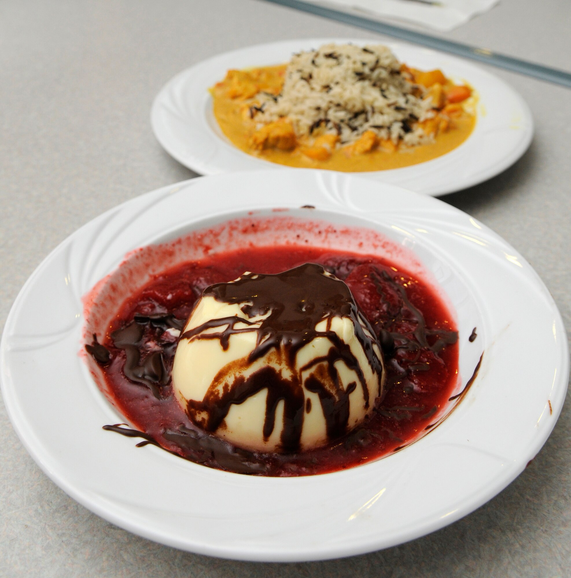 SPANGDAHLEM AIR BASE, Germany –Team Three takes first place in the Kid’s Iron Chef Competition with their sweet chicken curry dish at the Mosel Dining Facility Jan. 27. Team Three consisted of team leader Dennis Pautges, 52nd Force Support Squadron, (left to right) William Moreau, son of Tech. Sgt. Jay Moreau, 52nd Civil Engineer Squadron; Alex Harris, daughter of Master Sgt. Lance Harris, 52nd Logistics Readiness Squadron; Jacob Hite, son of Tamerra Hite, 52nd Contracting Squadron; and Noah Thomas, son of Capt. Wendy Hatter, 52nd Medical Operations Squadron.  (U.S. Air Force photo/Airman 1st Class Staci Miller)