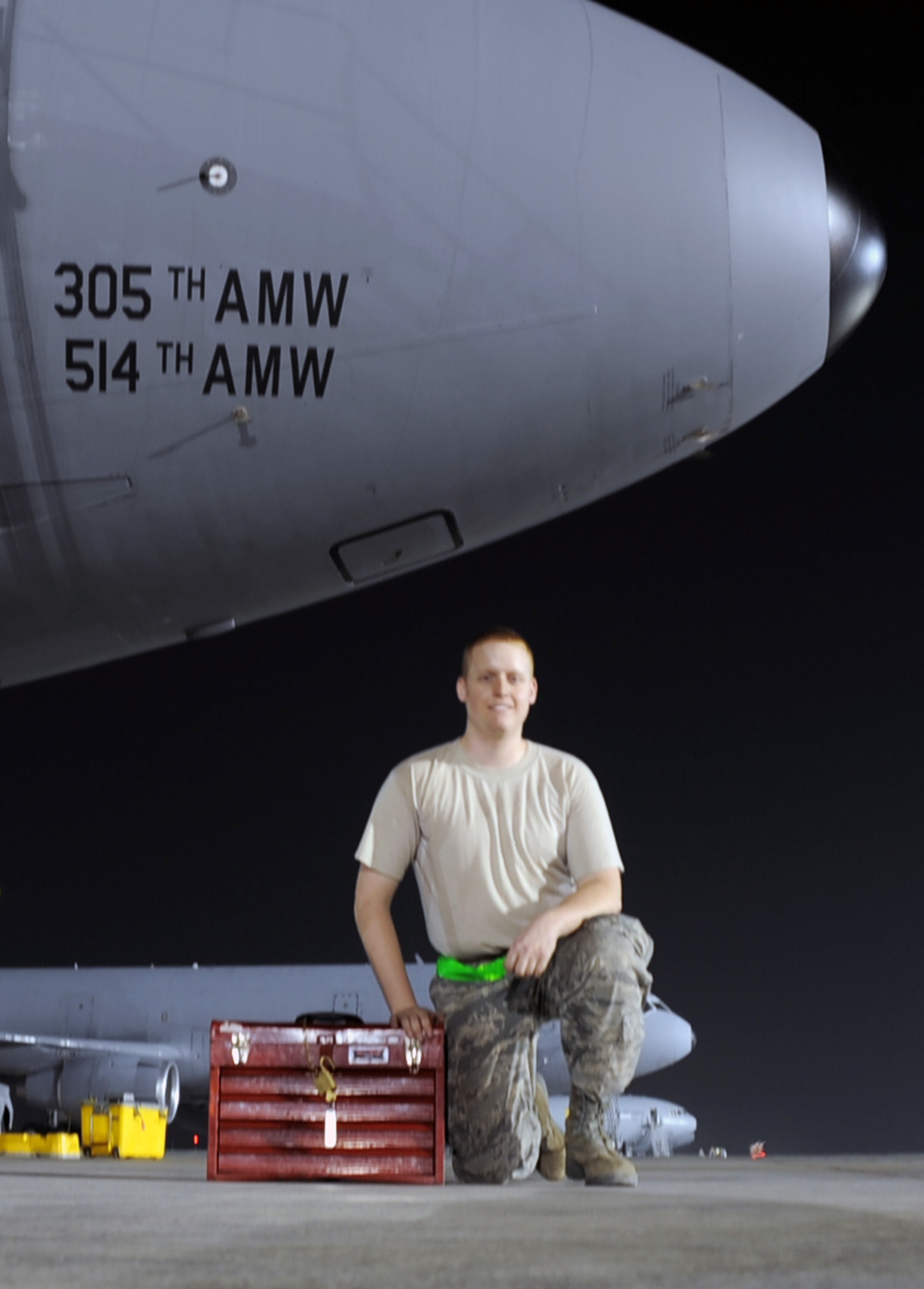 Airman 1st Class Garret Coleman is a KC-10 Extender maintenance Airman with the 380th Expeditionary Aircraft Maintenance Squadron, looks through a toolbox while working on the flightline at a non-disclosed base in Southwest Asia on Jan. 31, 2010.  Airman Coleman is deployed from the 605th Aircraft Maintenance Squadron at Joint Base McGuire-Dix-Lakehurst, N.J., and his hometown is Springfield, Mo.  (U.S. Air Force Photo/Master Sgt. Scott T. Sturkol/Released)