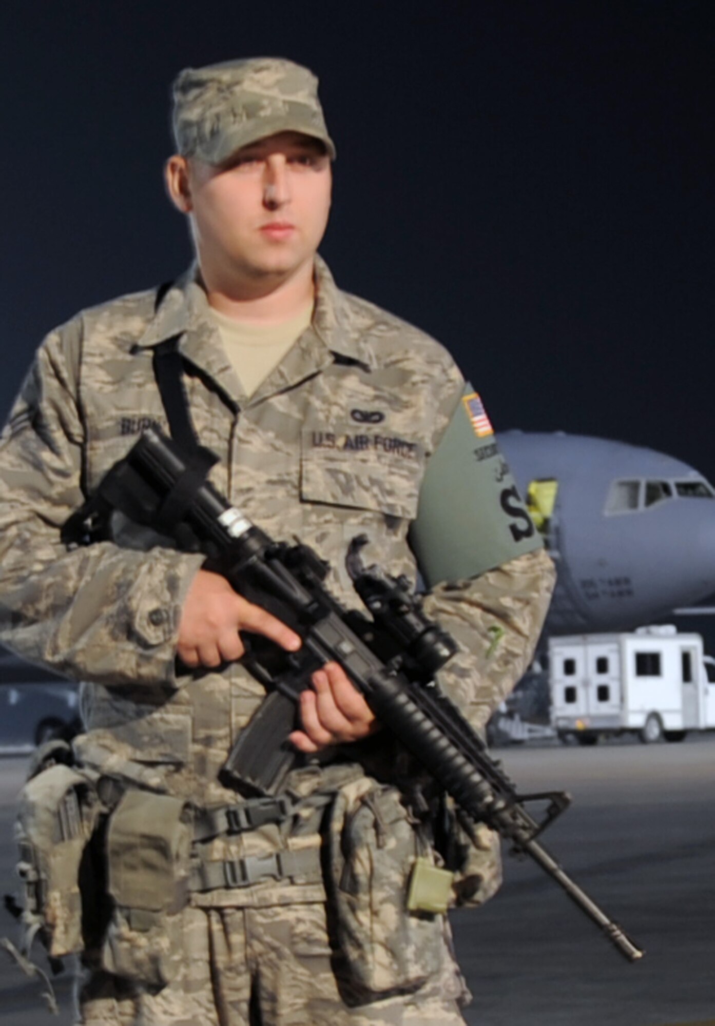 Senior Airman Christopher Burk, security forces journeyman with the 380th Expeditionary Security Forces Squadron, watches over the flightline at a non-disclosed base in Southwest Asia on Jan. 31, 2010. Security forces Airmen like Airman Burk are in charge of protecting and providing security for thousands of deployed service members and millions of dollars worth of deployed military assets and equipment. Airman Burk is deployed from the 81st Security Forces Squadron at Keesler Air Force Base, Miss., and his hometown is Ocean Springs, Miss.  (U.S. Air Force Photo/Master Sgt. Scott T. Sturkol/Released)
