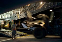 Airmen unload cargo from a C-17 at Aeroport International Toussaint Louverture in Port-au-Prince, Haiti, Jan. 31. The cargo consists of equipment and supplies for supporting relief efforts in Haiti. (U.S. Air Force photo/Staff Sgt. Barry Loo)