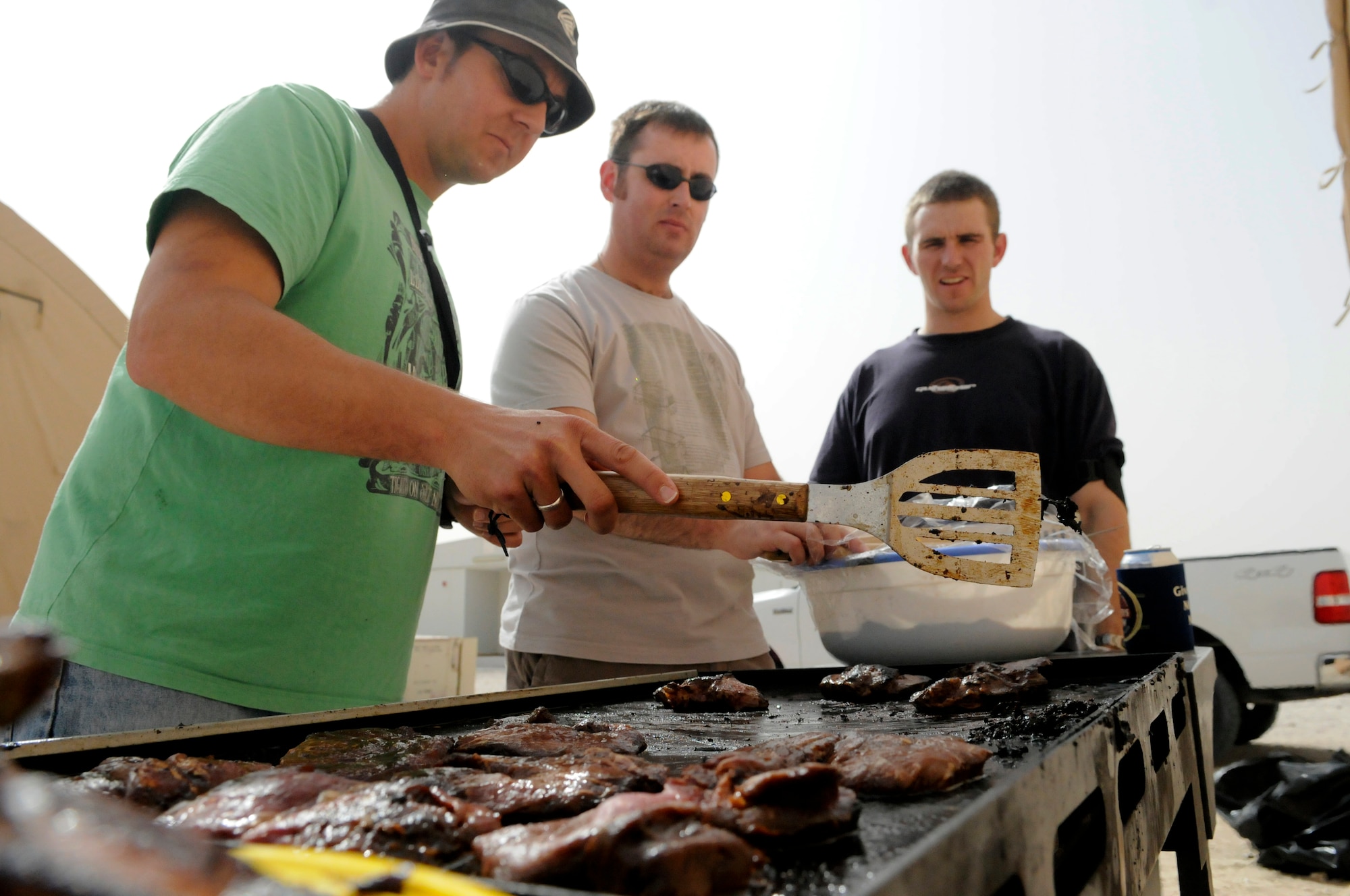 The Austrailian military contingent celebrated Australia Day at a non-disclosed Southwest Asia location, Jan. 26, 2010. The celebration included a barbecue, conversation, mingling with Coalition forces and watching a broadcast of an Australian team competing in a cricket match. (U.S. Air Force photo by Senior Master Sgt. David Byron)[RELEASED]