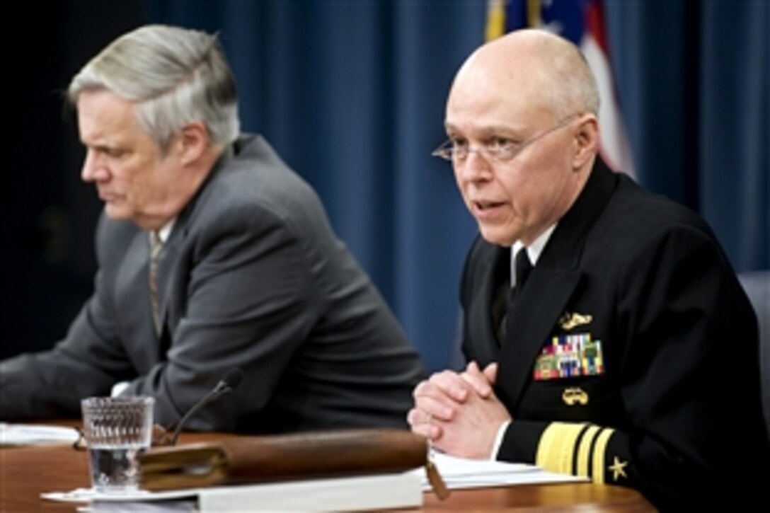 The Defense Department's Director of  Force Structure Navy Vice Adm. Steve Stanley and Under Secretary of Defense Comptroller Robert Hale conduct a press conference to provide an overview of the fiscal year 2011 defense budget request and the fiscal year 2010 supplemental war funding request at the Pentagon, Feb. 1, 2010.  