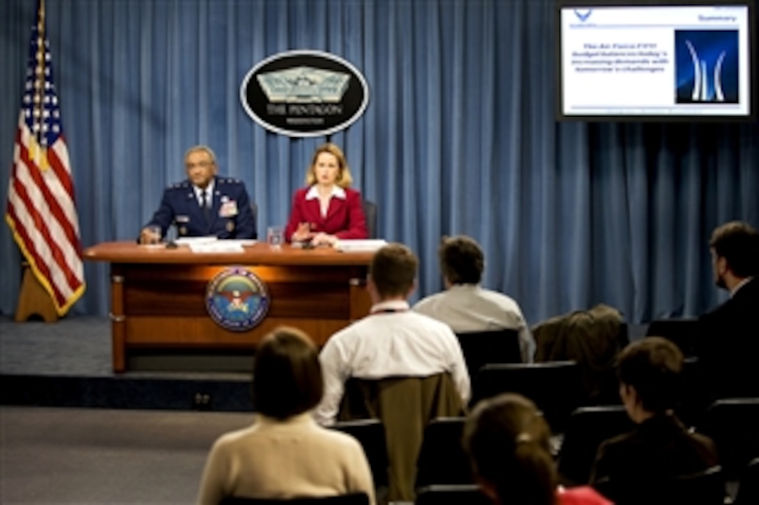 Air Force Maj. Gen. Alfred Flowers, deputy assistant secretary for  budget, Office of the Assistant Secretary of the Air Force for Financial Management and Comptroller, and Marilyn Thomas, budget deputy, conduct a press conference to discuss the fiscal year 2011 defense budget request and the fiscal 2010 supplemental war funding request at the Pentagon, Feb. 1, 2010.  