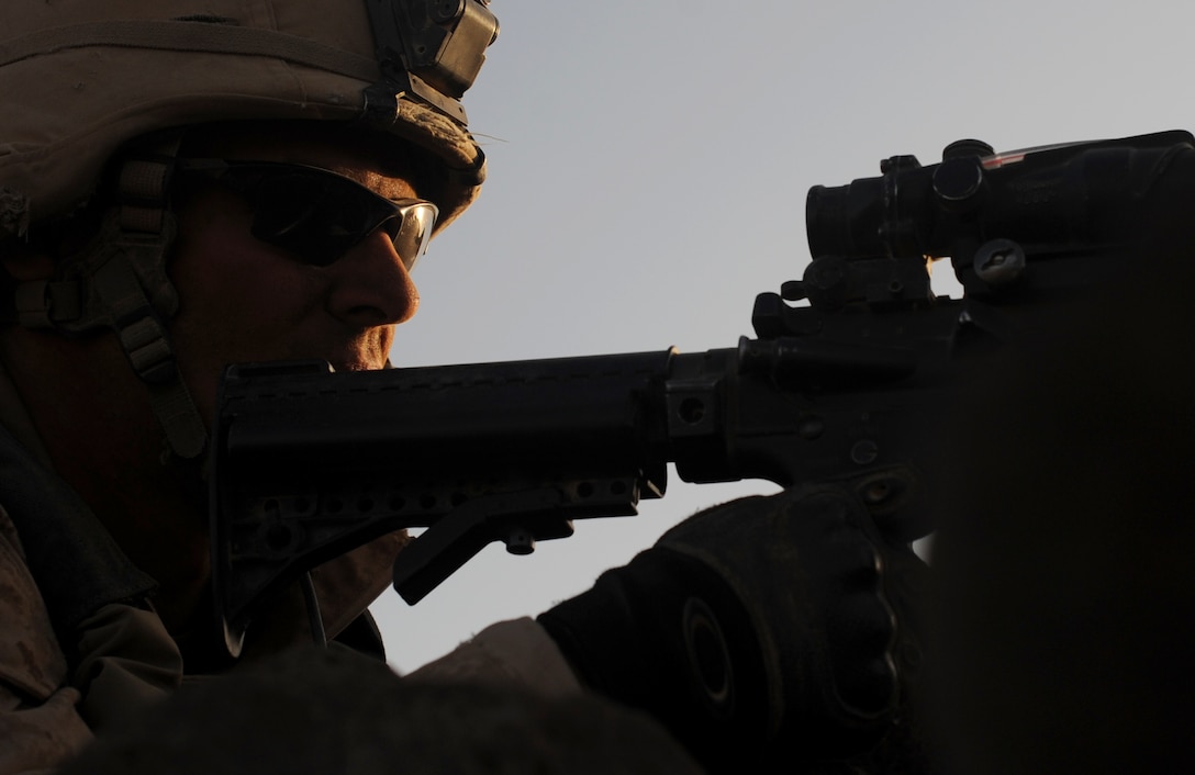 Sergeant Eric Laisure, from Hesperia, Mich., holds security during an exercise with the French Army here Feb. 1. Laisure is a section leader with Light Armored Reconnaissance Platoon, Weapons Company, Battalion Landing Team 2/4, 11th Marine Expeditionary Unit.
