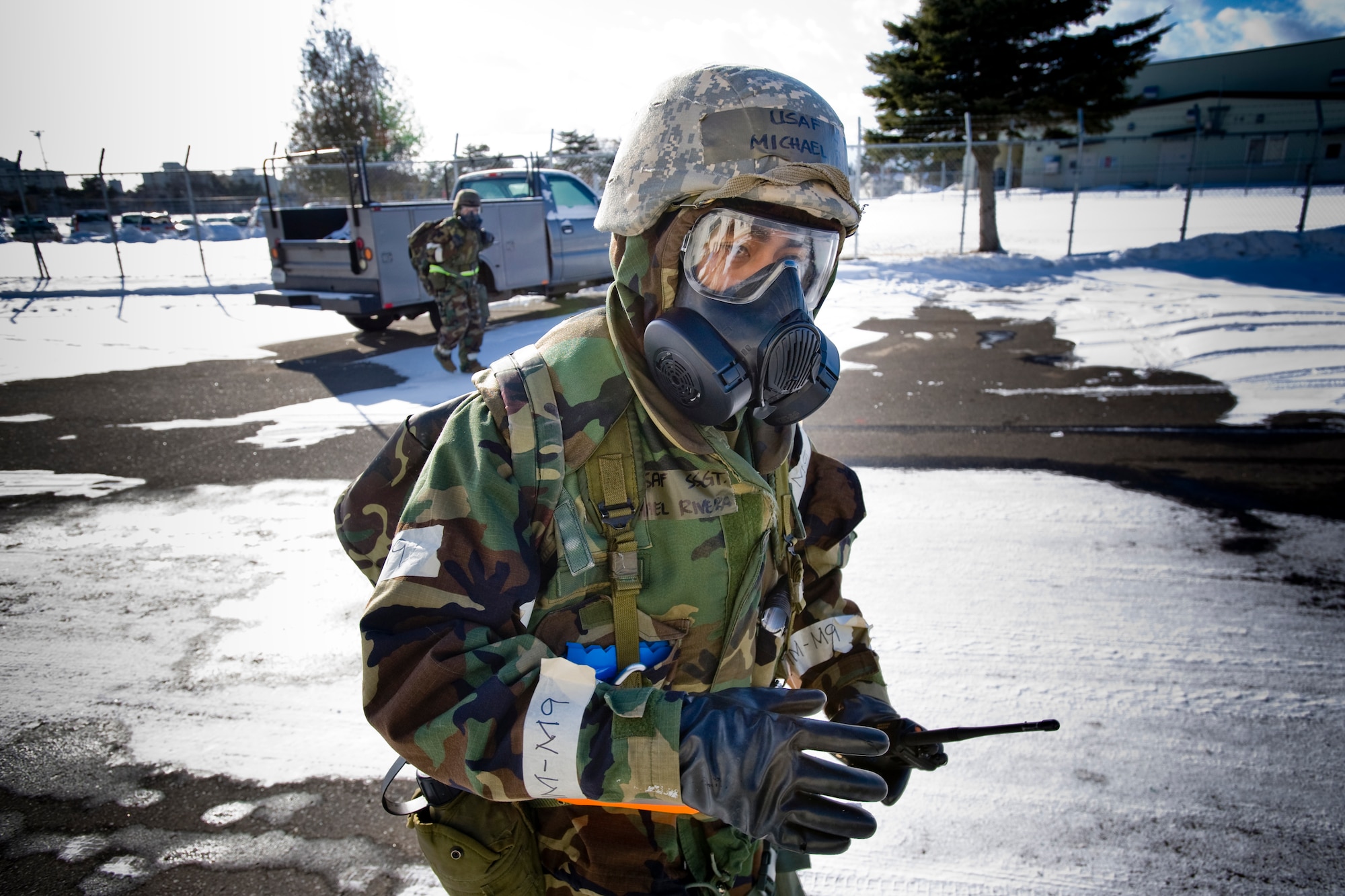MISAWA AIR BASE, Japan -- Staff Sgt. Michael Rivera, 35th Civil Engineer Squadron water and fuels maintenance technician, and Senior Airman Anthony Santiago, 35th CES pest-management technician, conduct a post-attack reconnaissance sweep at the civil engineer compound Feb. 3 during an operational readiness exercise. During the sweep, the team checked for casualties, unexploded ordinance and facility and equipment damage. (U.S. Air Force photo/Senior Airman Jamal D. Sutter)