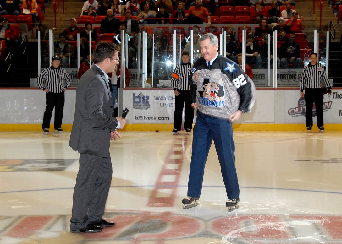 Brig. Gen. O.G. Mannon, 82nd Training Wing commander, is presented a personalized Wichita Falls Wildcats hockey team jersey by Bryan "Moose" Panik, the Wildcats' ice program coordinator, in recognition of the Military Appreciation Night Jan. 30 at the Kay Yeager Coliseum (U.S. Air Force photo/Mike Litteken) 
