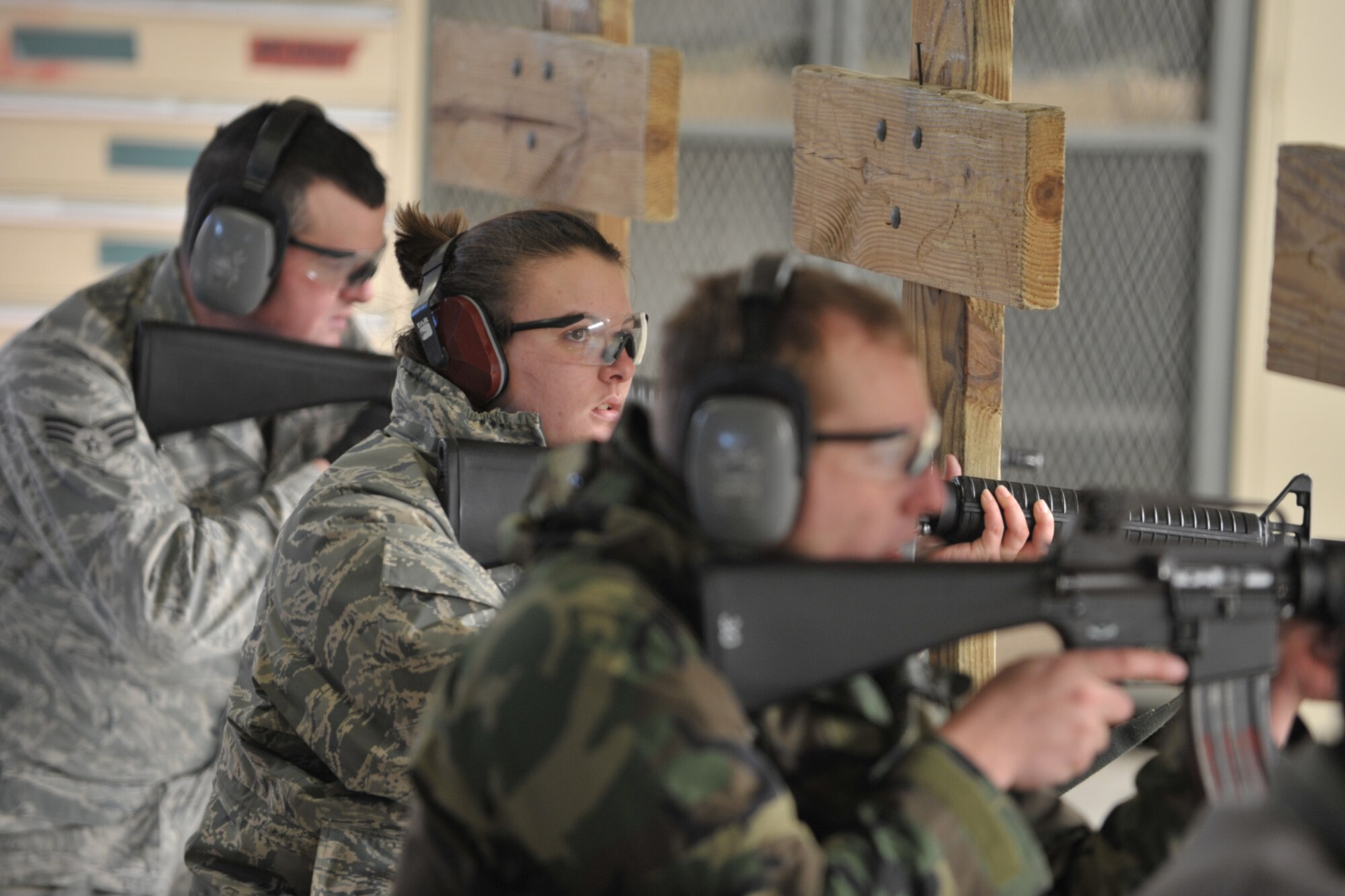 Senior Airman Andrea Foster-Pincoski awaits the command to fire during combat arms training at McConnell Air Force Base, Kan. She is an Air Force Reservist assigned to the 931st Civil Engineer Squadron at the base. (U.S. Air Force photo/Master Sgt. Jason Schaap)