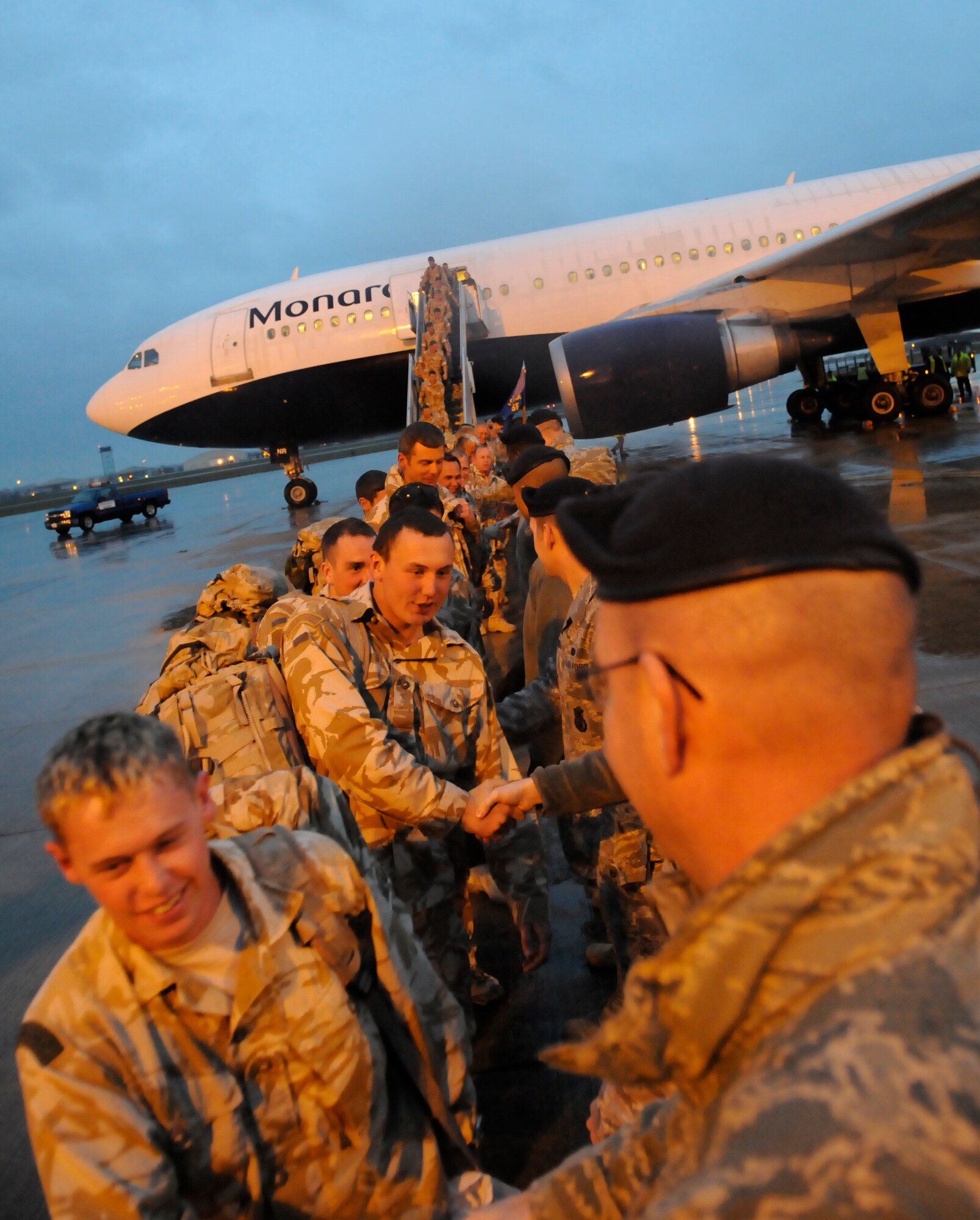 RAF MILDENHALL, England -- Roughly 150 airmen from 27 Sqd RAF Regiment land at RAF Mildenhall Feb. 2 on their way home to RAF Honington after a six-month deployment to Kandahar Air Base, Afghanistan.  The landing at RAF Mildenhall  brought the airmen about five hours closer to home than their usual landing point at RAF Brize Norton.  (U.S. Air Force photo/Staff Sgt. Christopher L. Ingersoll)