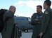 Lt. Col. Brett Williams (left) speaks with Col. Julio Lopez, 35th Expeditionary Airlift Squadron commander, after arriving Jan. 30 to Muniz Air Base, Puerto Rico. Colonel Williams and approximately 50 Airmen assigned to the North Carolina Air National Guard's 145th Airlift Wing traveled to Puerto Rico for a two-week stint in support of Air Expeditionary Force Coronet Oak and its various missions providing earthquake relief to nearby Haiti. The Airmen are expected to be at Muniz until mid February. Colonel Williams is the mission commander for the North Carolina Guardsmen. (U.S. Air Force photo/Staff Sgt. Stephen J. Collier) 
