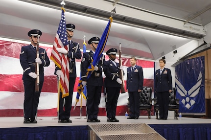 (Left to right) Senior Airman Kyle Hicks, Senior Airman Michael Kennison, Tech. Sgt. Doc Buldoc and Tech. Sgt. Deborah Galbreith, members of the Randolph Air Force Base Honor Guard, present the colors at an activation ceremony here Tuesday in Hangar 4, as Brig. Gen. Leonard Patrick, 502d Air Base Wing commander, and Col. Jacqueline Van Ovost, 12th Flying Training Wing commander, prepare to officiate the ceremony. In the ceremony, the 12th Mission Support Group inactivated and became the 902d MSG under the 502d Air Base Wing, also known as Joint Base San Antonio. The 12th MSG's four squadrons and three divisions, the 12th Comptroller Squadron and the 12th Flying Training Wing staff agencies also joined the 502d ABW during the ceremony. (U.S. Air Force photo/Rich McFadden)