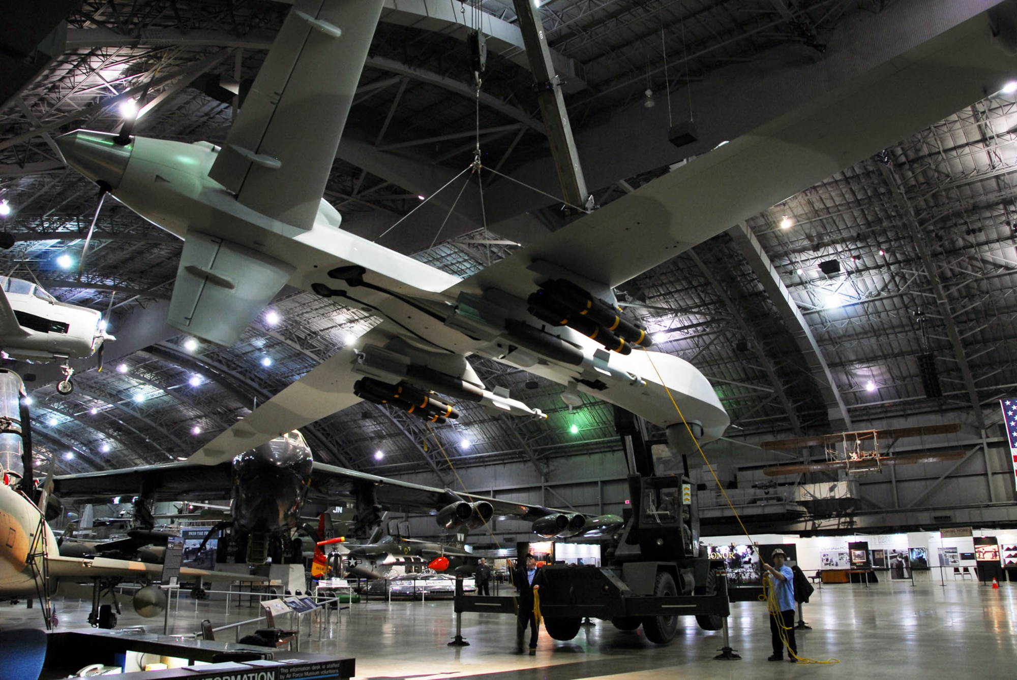 DAYTON, Ohio (01/2010) -- Restoration crews prepare to suspend the YMQ-9 Reaper from the ceiling at the National Museum of the U.S. Air Force. (U.S. Air Force photo)