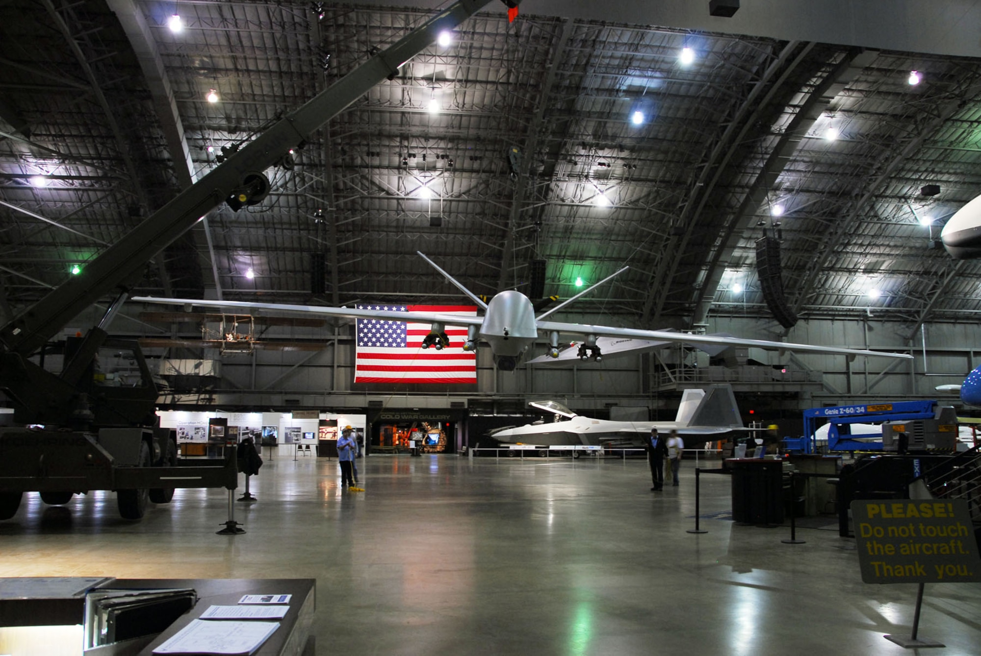 DAYTON, Ohio (01/2010) -- Restoration crews prepare to suspend the YMQ-9 Reaper from the ceiling at the National Museum of the U.S. Air Force. (U.S. Air Force photo)