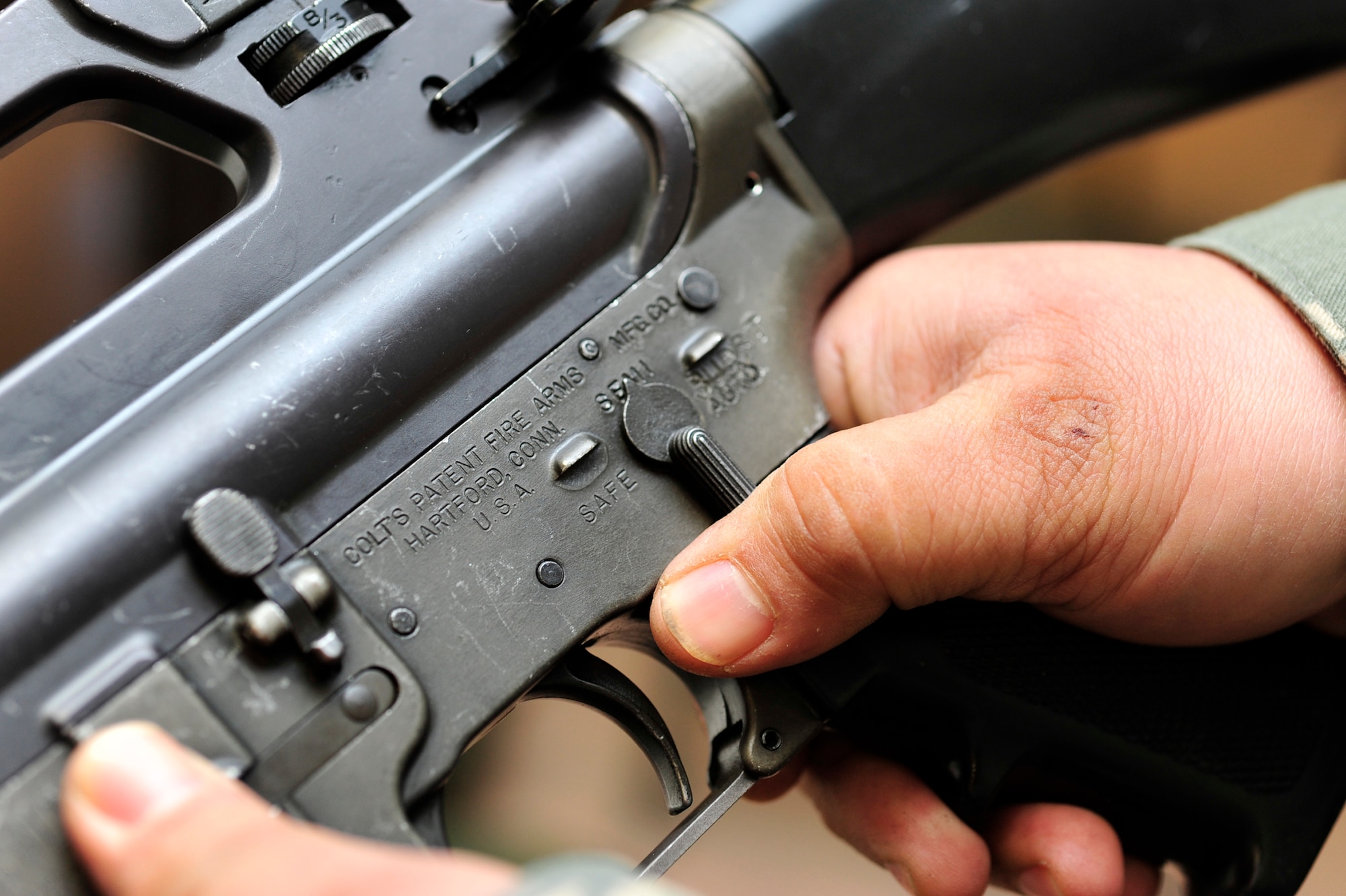 A student tests clearing procedures on an M-16A2 rifle during a Combat Arms Training and Maintenance class on base Jan 21. The steps for clearing out a weapon are to make sure the weapon is on safe, release the magazine, check the chamber to make sure it is empty and then check the safety one last time. (U.S. Air Force photo by Airman 1st Class Lausanne Pacheco)