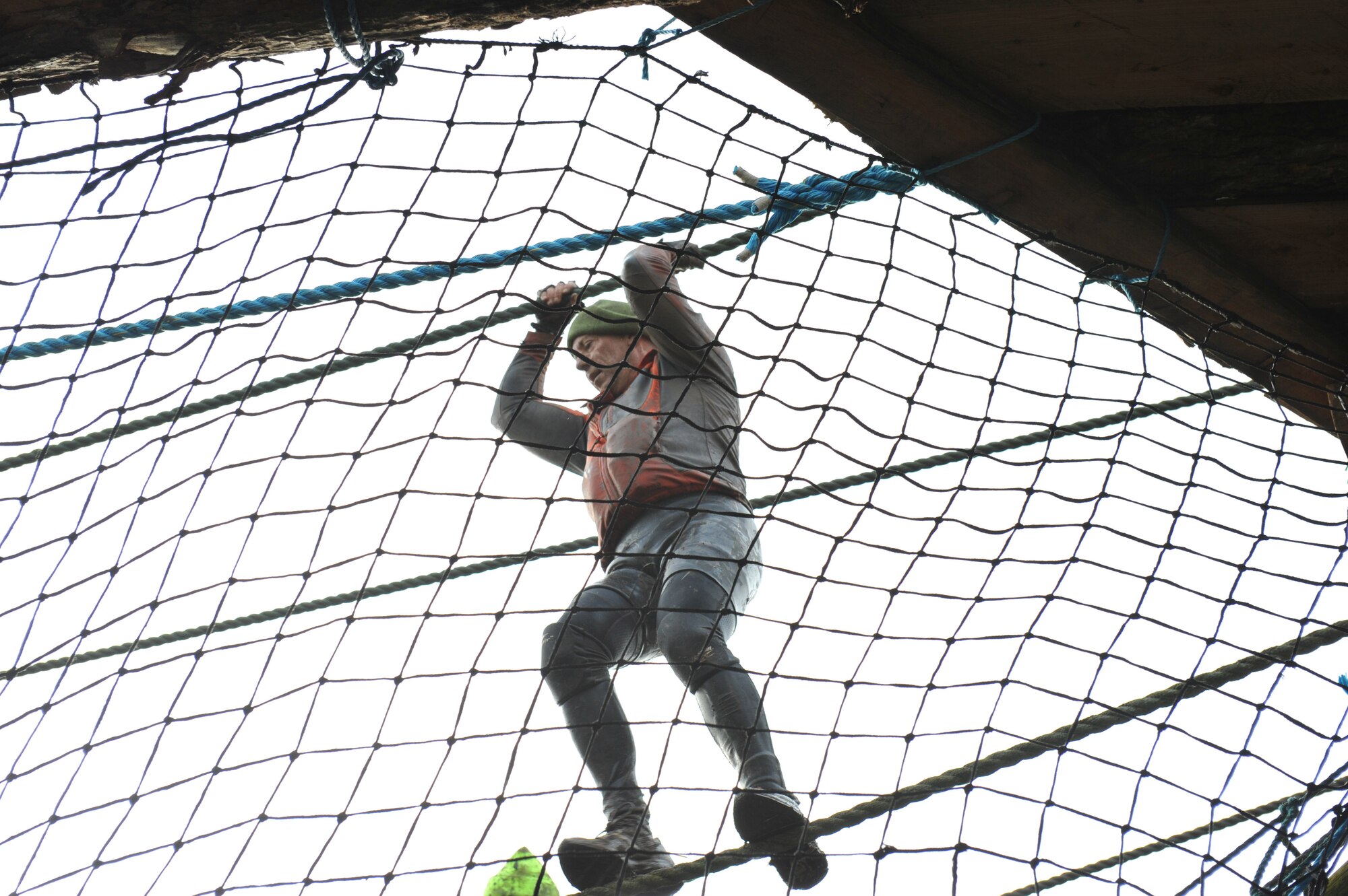 United States Marine Corps Col. Peter H. “Pete” Devlin, JAC commander, crosses the tight rope during the Tough Guy Challenge near Birmingham, England.   (Photo by Air Force Staff Sgt. Javier Cruz)