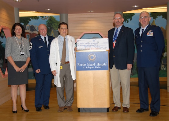 The National Guard Association of Rhode Island presents a check to the Hasbro Children's Hospital for $100,000. This money was raised during the 2009 Rhode Island National Guard Open House Air Show.