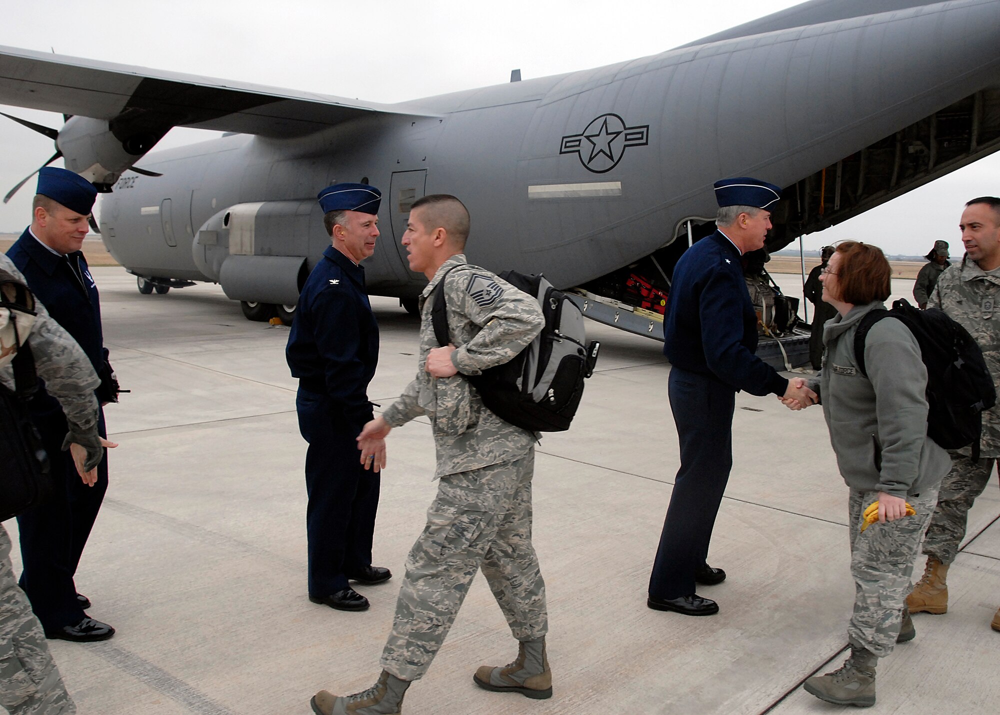 Brig. Gen. O.G. Mannon (right, in blues), 82nd Training Wing commander, greets members of the Air Education and Training Command Inspector General team Feb. 1 at the base operations ramp. The team's arrival marks the beginning of the 82nd Training Wing's Unit Compliance Inspection. Also pictured from Sheppard include Col. Michael Hake, 82nd TRW vice commander, and Command Chief Master Sergeant Chief Master Sgt. Kenneth Sallinger. (U.S. Air Force photo/Mike Litteken)