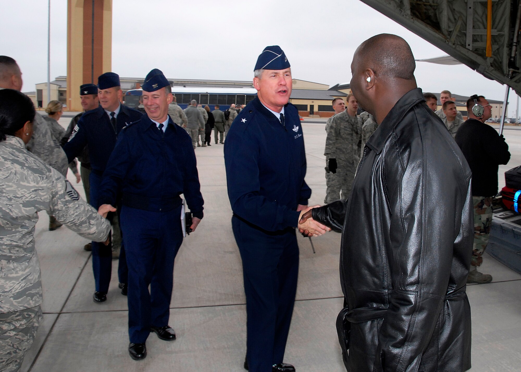 82nd Training Wing Commander Brig. Gen. O.G. Mannon, center, greets a member of the Air Education and Training Command Inspector General team Feb. 1 after the team's arrival at Sheppard Air Force Base. The team begins it's week-long inspection of the wing Feb. 2. Also pictured from Sheppard include Col. Michael Hake, 82nd TRW vice commander, and Command Chief Master Sergeant Chief Master Sgt. Kenneth Sallinger. (U.S. Air Force photo/Mike Litteken)
