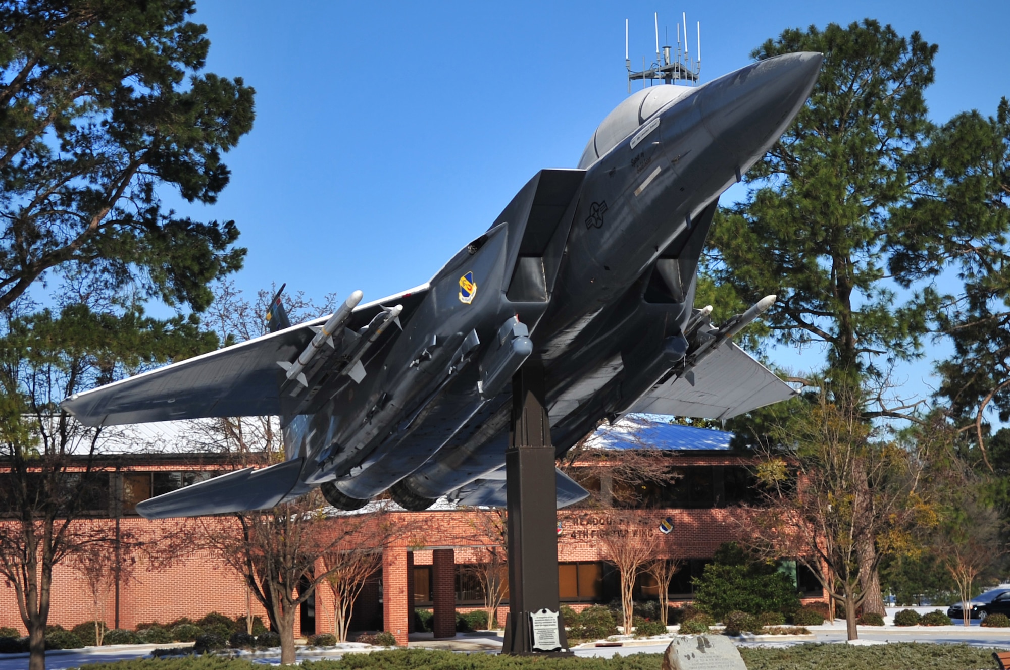 A layer of snow covers the F-15E Strike Eagle static display outside the 4th Fighter Wing headquarters building after a winter storm left Seymour Johnson Air Force Base, N.C., and surrounding areas scrambling to clear roads Jan. 31, 2010. Local officials encouraged residents not to drive until road crews could clean up after Mother Nature. (U.S. Air Force photo/Senior Airman Rae Perry)