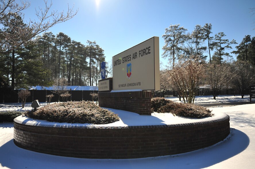 Snow and ice cover the Seymour Johnson Air Force Base, N.C. main gate's welcome sign after a winter storm passed through the area Jan. 30, 2010.  The snow and ice shutdown numerous businesses for the day in the surrounding town of Goldsboro. (U.S. Air Force photo/Senior Airman Rae Perry)