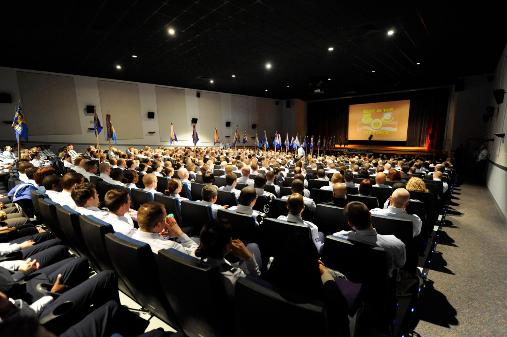 Airmen attend the kick-off rally a the Base Theater here Feb. 1 to highlight Team Dover's enthusiasm as they compete for the 2010 Commander-in-Chief's Annual Award for Installation Excellence.  There are five board members currently evaluating 26 mission areas. Elmendorf AFB, Alaska, is the other finalist for the award. (U.S. Air Force photo/Jason Minto)