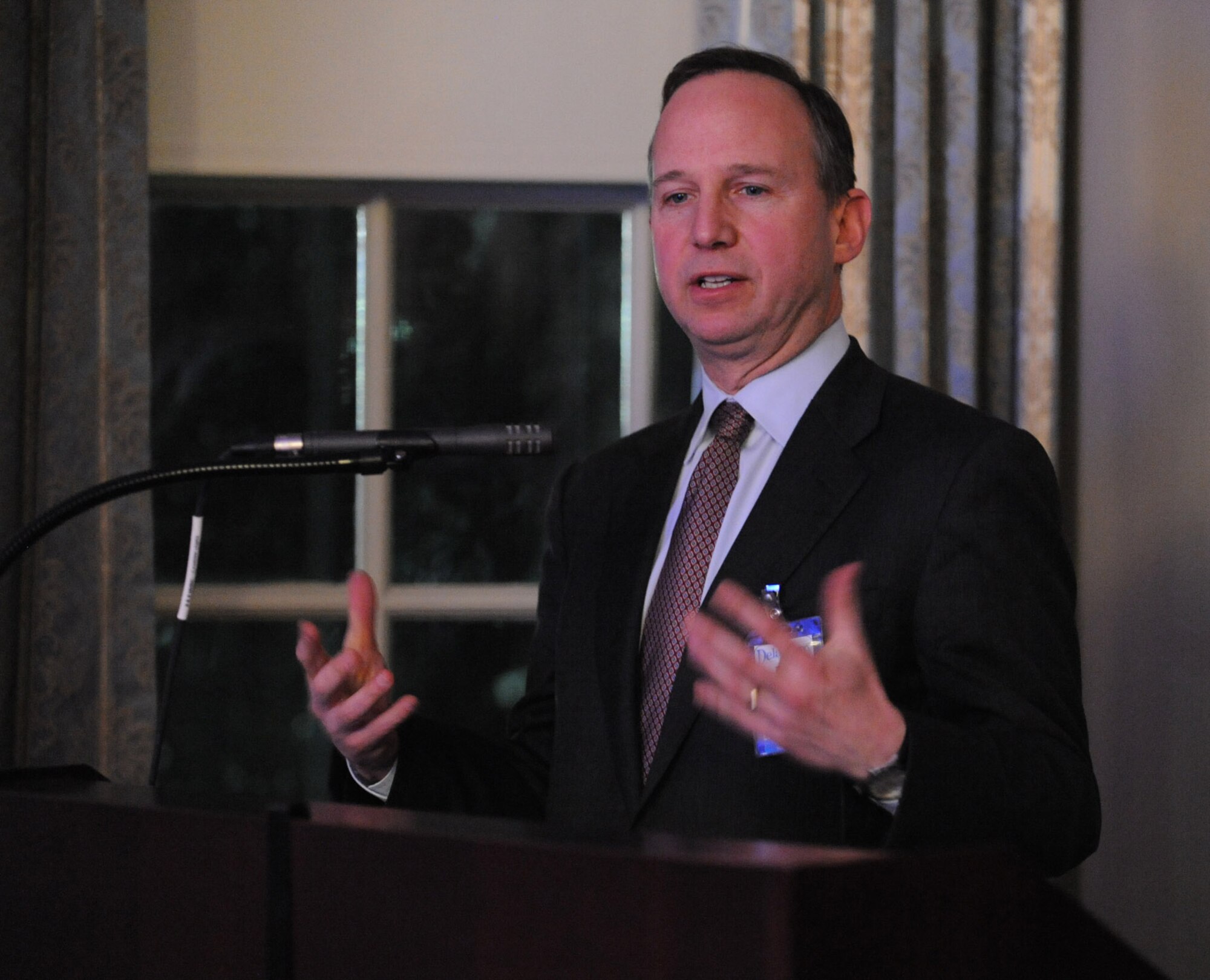 Delaware Governor Jack Markell addresses community and Dover Air Force Base  members attending an evening social at the Delaware Public Archives Feb. 1. The social was held in honor of the 2010 Air Force Commander-in-Chief Installation Excellence Award Visit. Five Installation Excellence Selection Board members are currently evaluating 26 mission areas. Elmendorf AFB, Alaska, is the other finalist for the award. (U.S. Air Force photo/Roland Balik)
