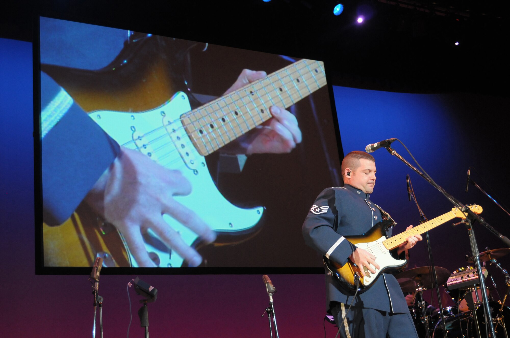FUSSA, Japan -- Staff Sgt. Daniel Bragdon, United States Air Force Band of the Pacific-Asia "Final Approach," performs a solo Jan. 31 during the U.S.-Japan joint concert. The concert, hosted by the North Kanto Defense Bureau, was a way to strengthen the Japanese and American relationship. (U.S. Air Force photo/Airman 1st Class Sean Martin) 