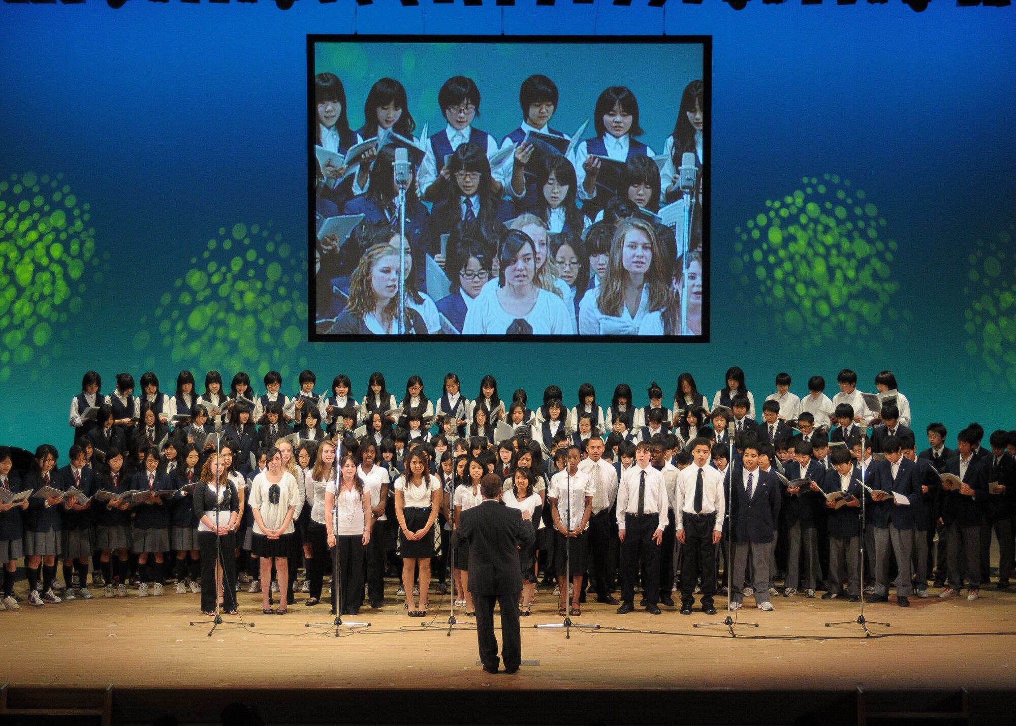 FUSSA, Japan -- The Yokota High School Choir and Fussa's Daiichi, Daini, Daisan Junior High School Choirs, perform together Jan. 31 during the U.S.-Japan Joint Concert. The concert, hosted by the North Kanto Defense Bureau, was a way to strengthen the Japanese and American relationship. (U.S. Air Force photo/Airman 1st Class Sean Martin) 