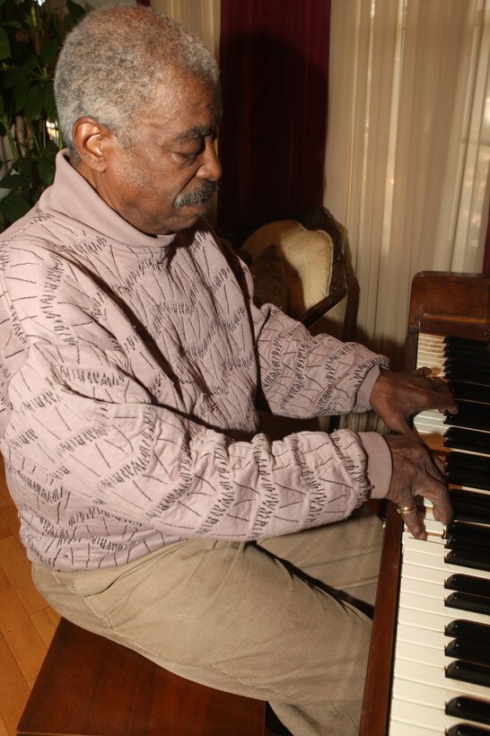 JACKSONVILLE, N.C. - Tony Mosely, the first black band officer in the Marine Corps, plays jazz music he wrote. Since leaving the Corps, Mosely has written several music books and plans to have his memoirs published.