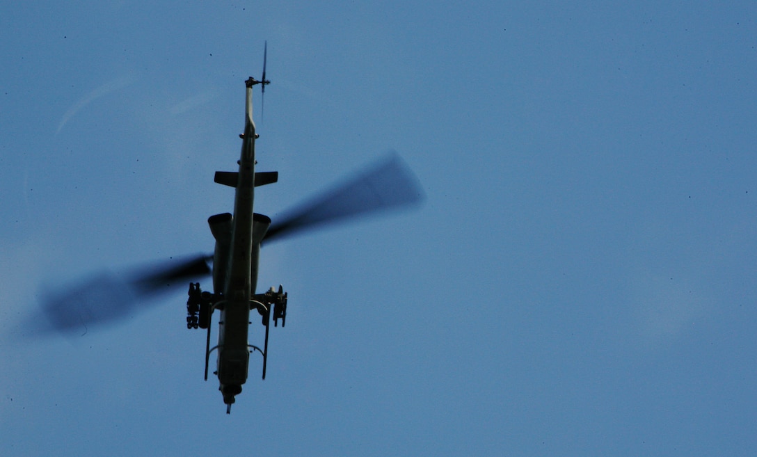 An AH-1 Cobra attack helicopter with Marine Medium Helicopter Squadron 265 Reinforced (HMM-265 REIN), 31st Marine Expeditionary Unit (MEU), soars above its ground element counterparts during an amphibious assault raid, Feb. 3. The MEU is currently participating in exercise Cobra Gold 2010 (CG’ 10). The exercise is the latest in a continuing series of exercises design to promote regional peace and security.