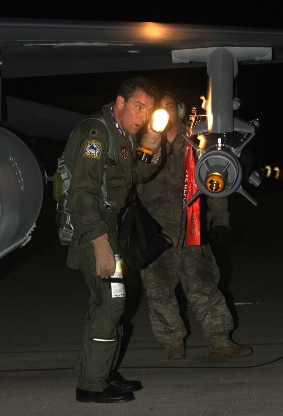 Lt. Col. David Smith, 93rd Fighter Squadron commander, performs a pre-flight inspection during the two-week long aerial combat training exercise, Red Flag. This is the first time in 16 years Homestead Air Reserve Base, Fla., has participated in Red Flag. (U.S. Air Force photo/ Tech. Sgt. Bucky Parrish)