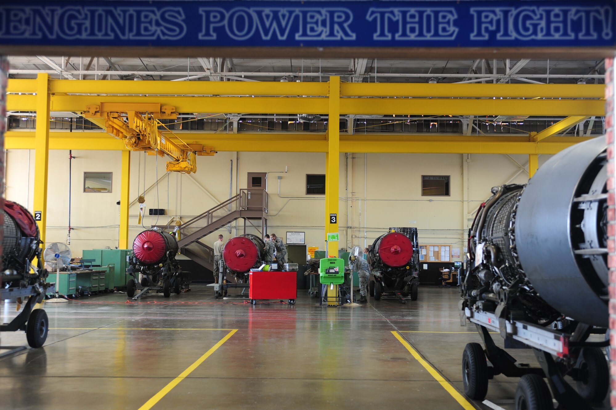 ELLSWORTH AIR FORCE BASE, S.D. -- A sign hangs in the 28th Maintenance Squadron aerospace propulsion maintenance shop, reminding Airmen how their job impacts today's fight, Feb 3. In the deployed environment, one of the B-1B Lancer's missions is to provide the combined forces air component commander with critical long-range strike capability and close air support as necessary. (U.S Air Force photo/Airman 1st Class Anthony Sanchelli)