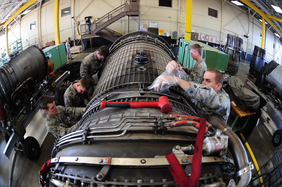 ELLSWORTH AIR FORCE BASE, S.D. -- Aerospace propulsion Airmen from the 28th Maintenance Squadron work on a B-1B Lancer engine, Feb 3.  Carrying the largest payload of both guided and unguided weapons in the Air Force inventory, the multi-mission B-1 is the backbone of America's long-range bomber force. (U.S Air Force photo/Airman 1st Class Anthony Sanchelli)