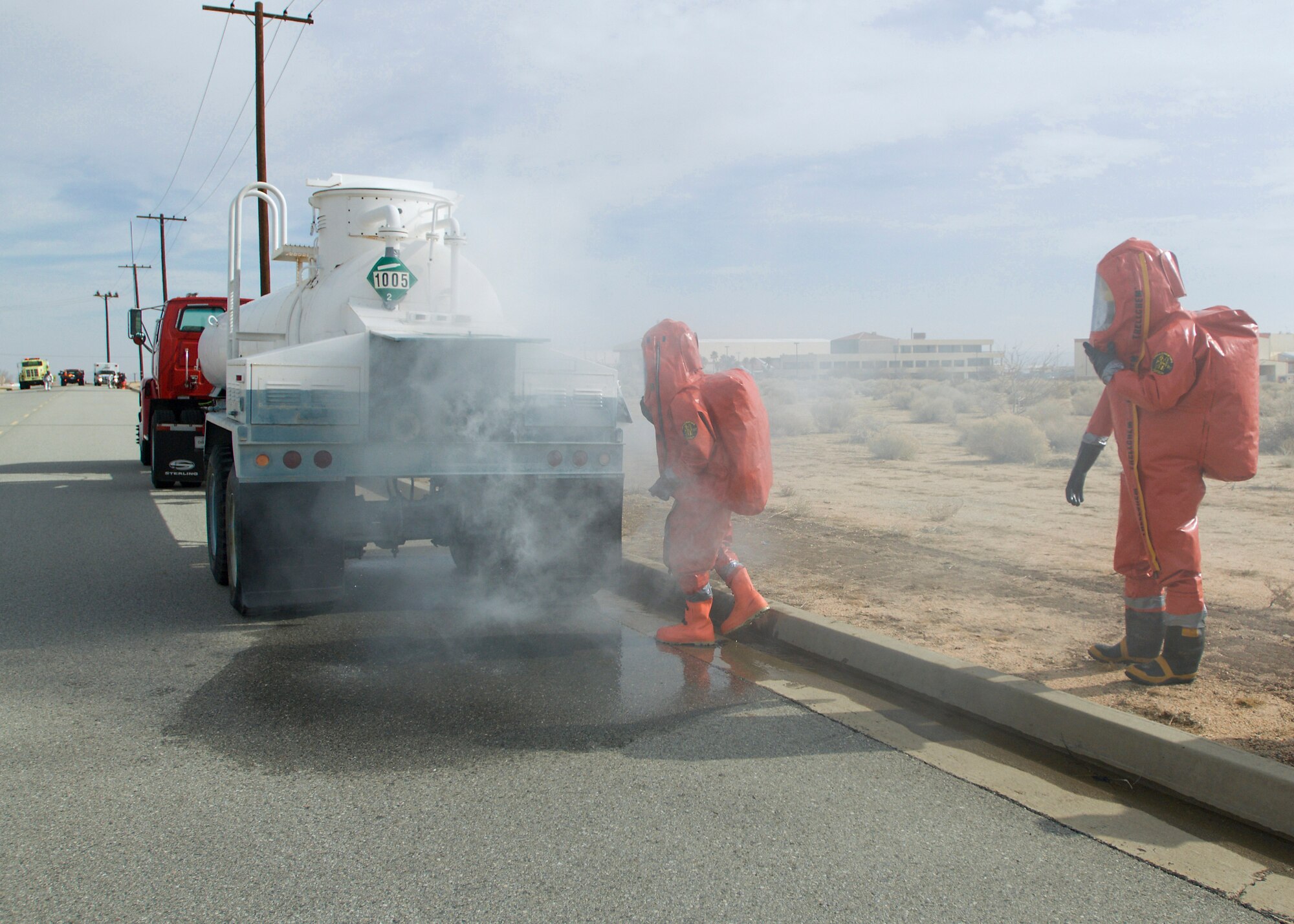 A hazardous material disposal team responds to a simulated chemical spill during a hazmat exercise as part of a basewide exercise Jan. 26. The exercise included Phase I and II of an Operational Readiness Exercise and an Emergency Management Exercise. (Air Force photo/Heather Anhalt)
