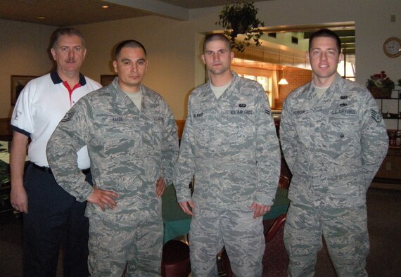 Air Force Reservist Staff Sgt. Christopher Whigham of the 302nd Services Flight (far right) along with (from left to right) Mr. John Karagiannes, Tech. Sgt. Rick Rayos and Airman Ross Belknap all from 21 Space Wing Force Services Squadron were the first responders to a local bread delivery man who collapsed while making a delivery to Aragon Dining Facility at Peterson Air Force Base, Colo. on Feb. 1.  Sergeant Whigham used the life-saving skills he learned on his civilian job as a police officer with the Albuquerque, N.M. police department to perform CPR.  (U.S. Air Force photo/Ann F. Skarban)