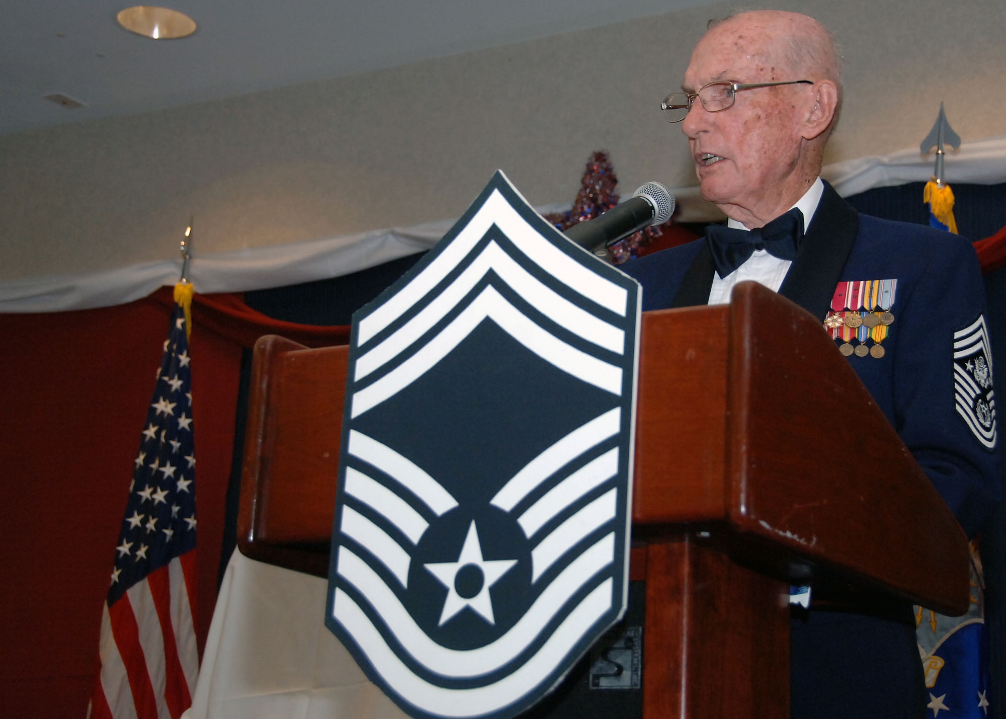 HICKAM AIR FORCE BASE, Hawaii -- Chief Master Sergeant of the Air Force James McCoy (retired) speaks at a Chief’s Recognition Ceremony at the enlisted club on Hickam Air Force Base, Hi. During his speech, he commended Hickam’s newest Chiefs for their ability to face new challenges and expressed his astonishment at the level of education the enlisted force pursues. Chief McCoy was the sixth enlisted member to obtain the rank of Chief Master Sergeant of the Air Force. (U.S. Air Force photo by Senior Airman Nathan Allen)