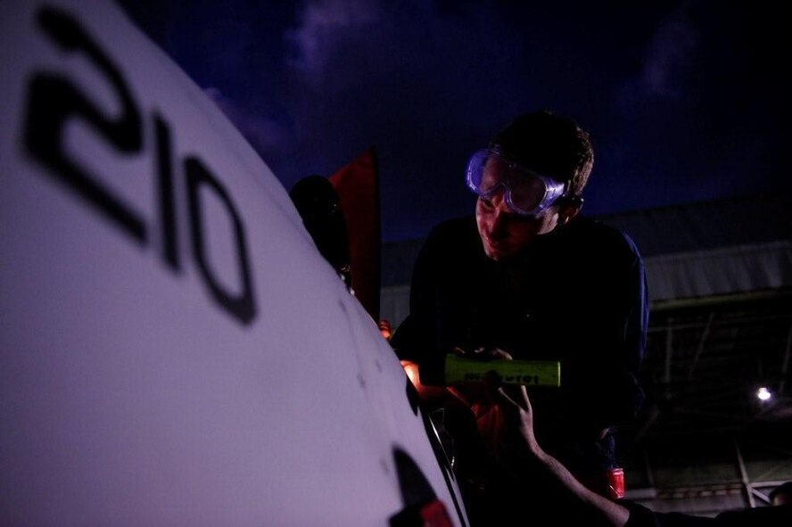 AGUADILLA, PUERTO RICO – Staff Sergeant Adam Snider, a crew chief assigned to the 432d Aircraft Maintenance Squadron, performs maintenance on an RQ-1 Predator Jan. 27. The RQ-1 Predator is an unarmed medium-altitude, long-endurance, remotely piloted aircraft system. (Courtesy photo) 