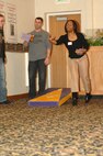 MINOT AIR FORCE BASE, N.D. -- Minot Airmen participate in a game called “corn hole” at the 45th Annual Sportsmen Feed held at the Jimmy Doolittle Center here Jan. 31. The feed is an annual event designed to build fellowship between the base and local community. (U.S. Air Force photo by Airman 1st class Aaron-Forrest Wainwright)