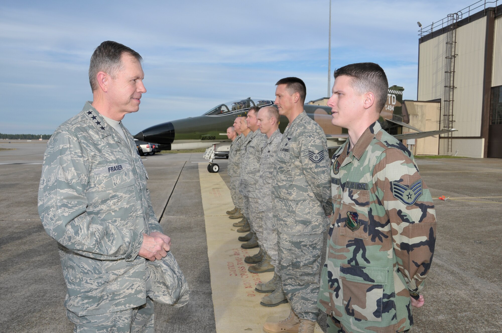 Gen. William Fraser, Air Combat Command commander, meets Staff Sgt Joseph E. Johnston, 53rd Test Support Squadron and several other NCOs during a visit to Tyndall AFB, Fla. (U.S. Air Force Photo by Lisa Norman)